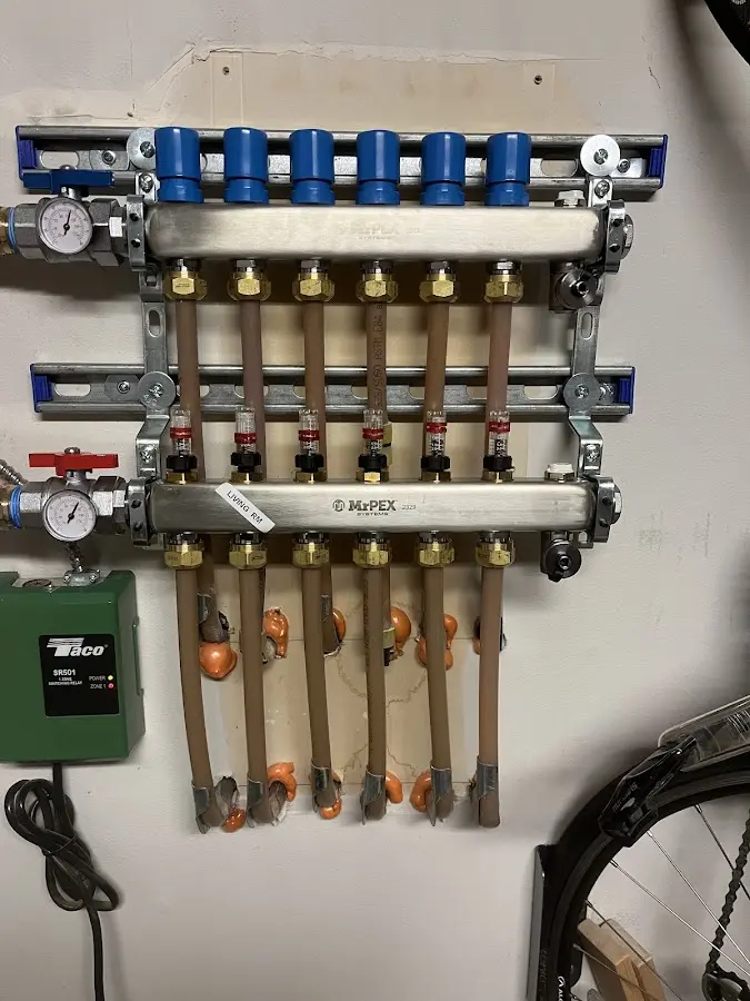 Plumber performing Gas Line Installation at a residential property in Cochran